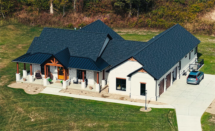 Aerial view of a custom-built, modern, single-story house. Built by Prime1 Builders in Pittsburgh
